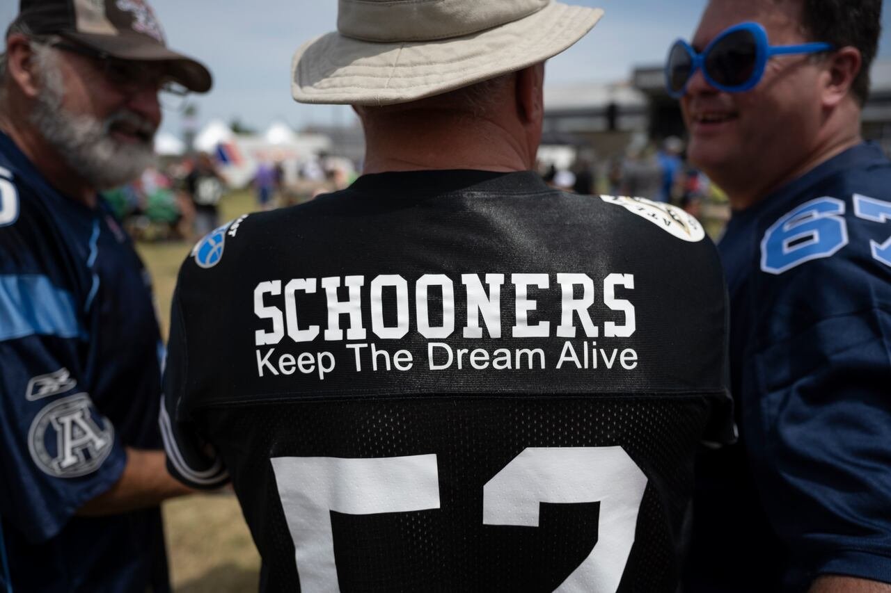 A CFL enthusiast donning an Atlantic Schooners jersey at a match in Wolfville, N.S., in 2022.