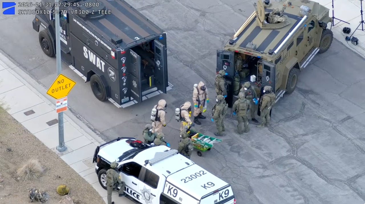 Drone footage released by Las Vegas Metropolitain Police shows a massive police presence at the site on Sugar Springs Drive in northeast Las Vegas.