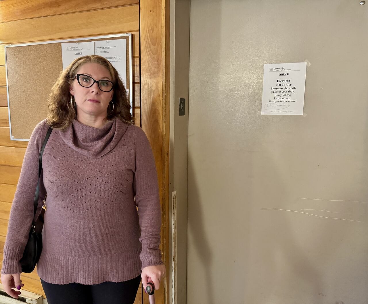 default-968 Image of a woman standing near the non-functional elevator at 285 Lourdes Street in Sudbury