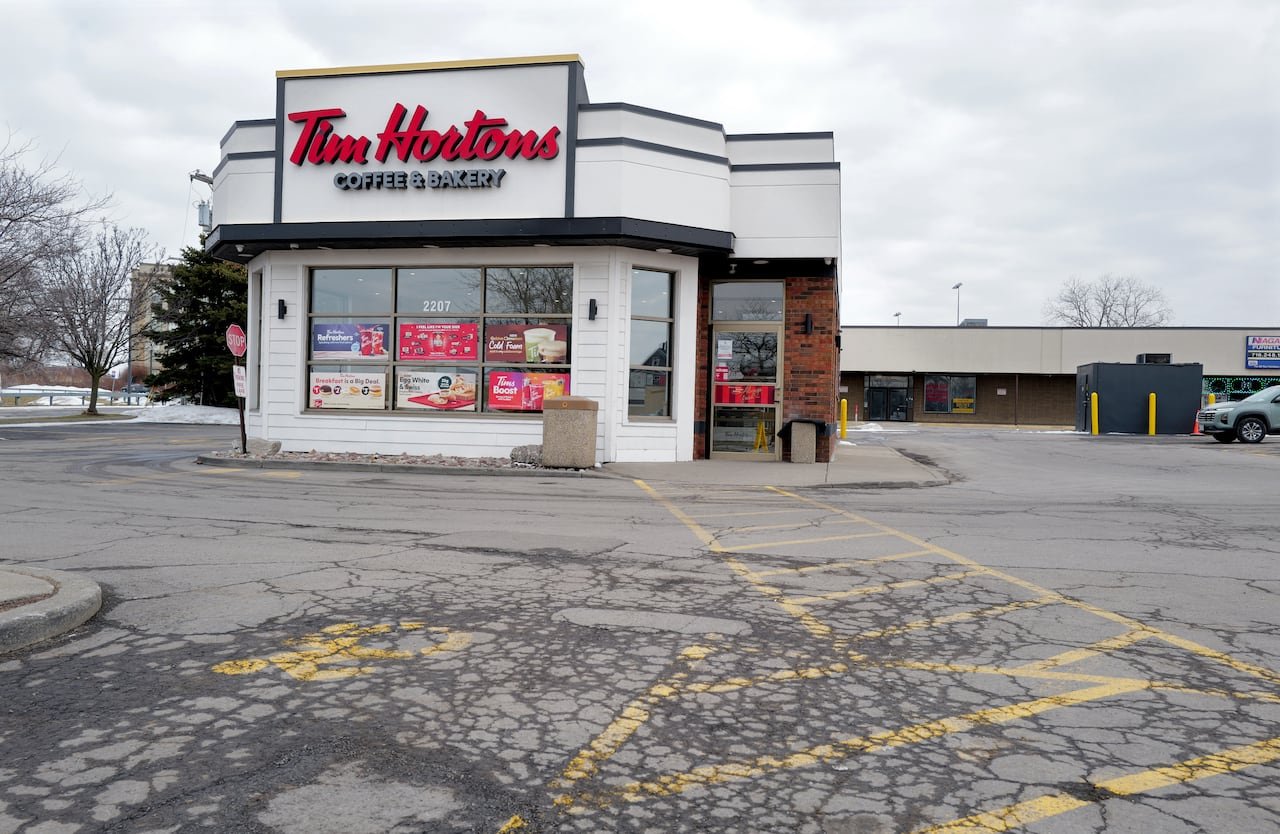 default-141 A Tim Hortons coffee shop is shown in a small plaza.